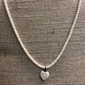 White pearl chocker with heart.